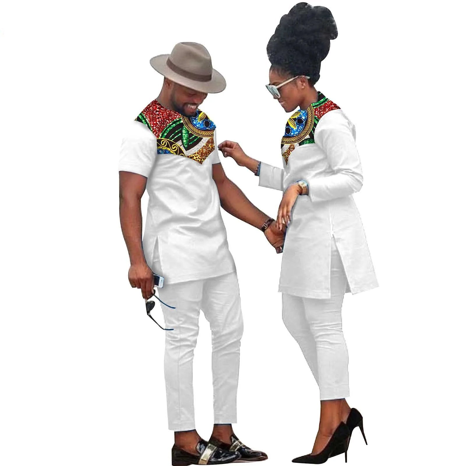 Two people wearing matching white outfits with colorful accents